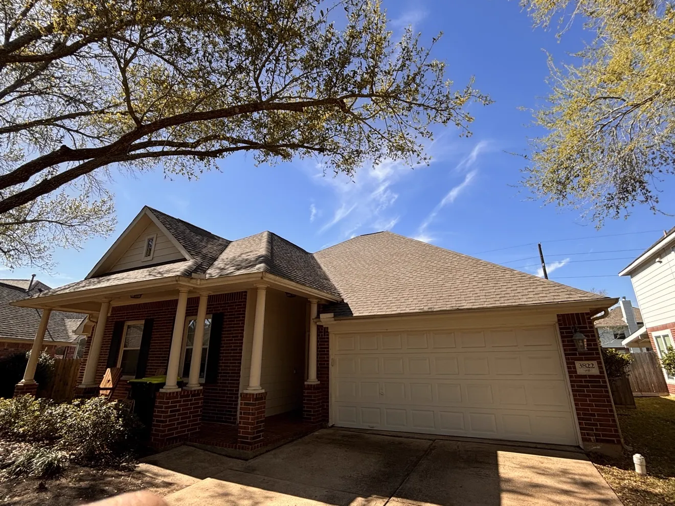 Home with a newly completed roof replacement
