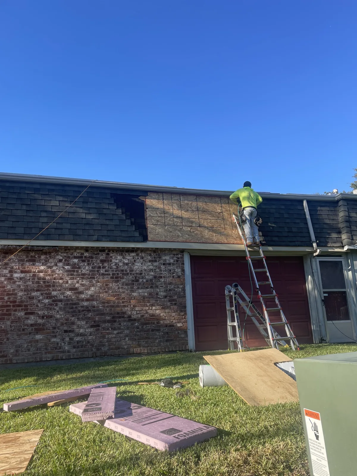 New OSB roof decking being installed
