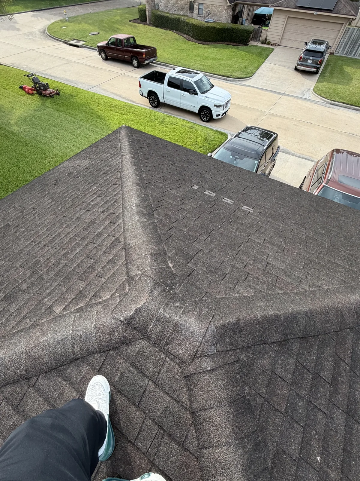 Roof before shingle and ridge repair in Sugar Land