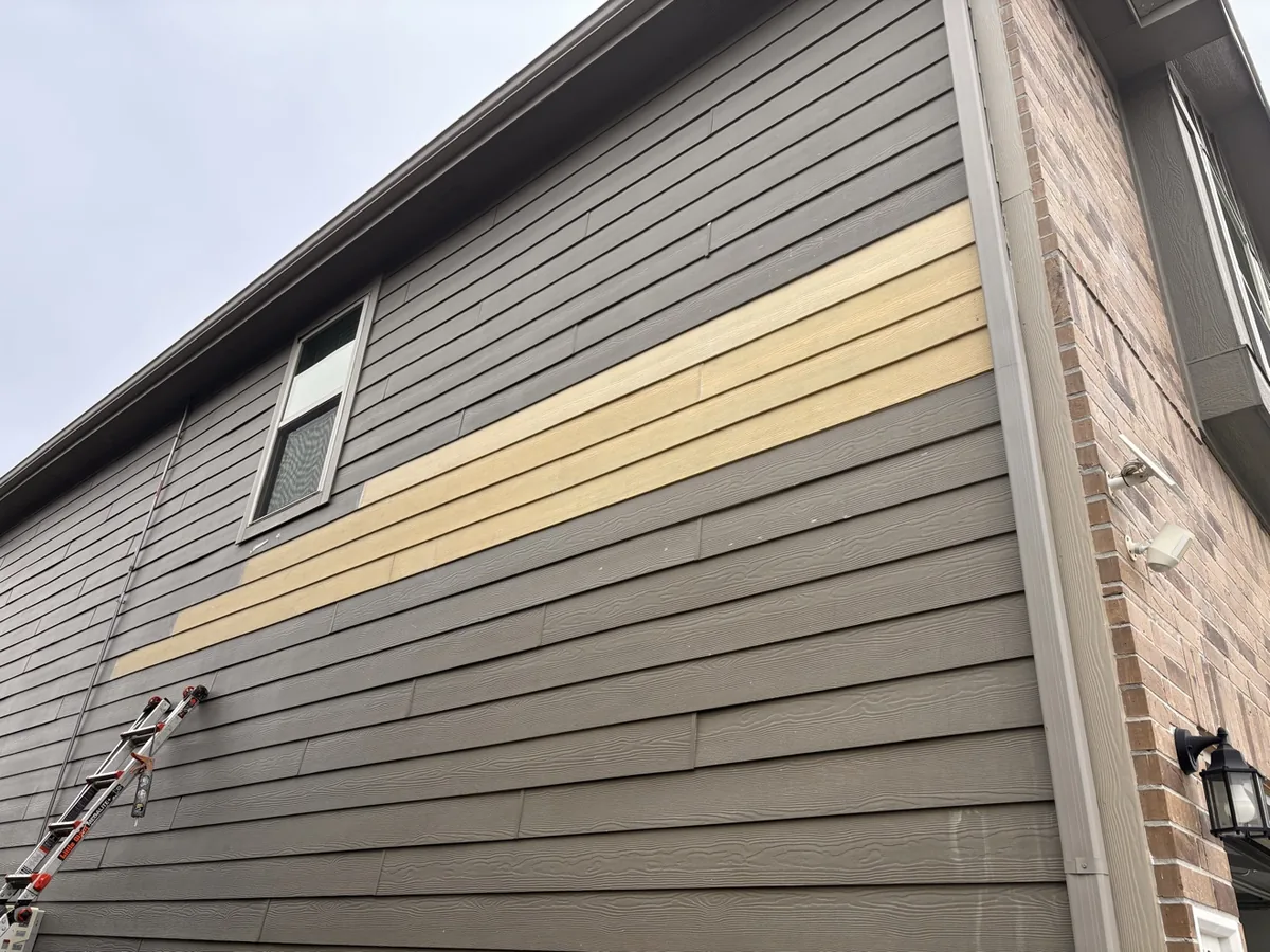 New James Hardie boards installed over the repaired wall section